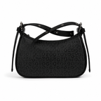 A black crescent-shaped shoulder bag with an all-over embossed monogram pattern, featuring a double strap design with crossed front straps and silver-tone hardware, shown on a plain white background.