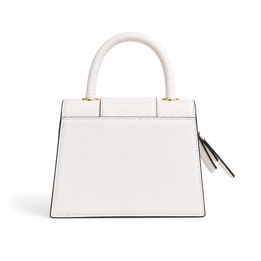 A structured white leather handbag with a curved top handle, gold-tone hardware, and a small black-and-white tassel charm, shown on a clean white background.