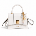 A white leather Aldo handbag with a structured top handle, gold-tone hardware, and a decorative charm featuring clear rhinestones and a gold-tone ALDO tag, shown on a clean white background.