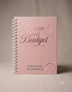 Pink notebook titled 'Bloom and Budget' on a beige background