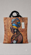 Tote bag with a design of a woman wearing a colorful headscarf on a wooden background.