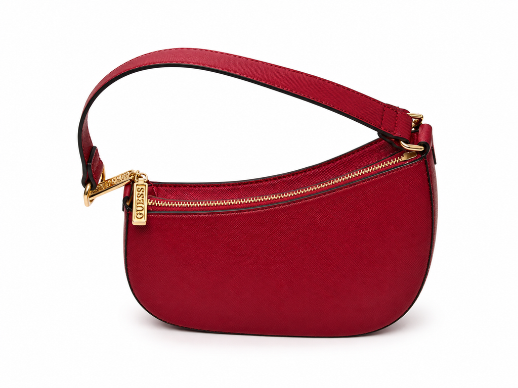 A red leather crescent-shaped shoulder bag with a gold-tone zipper and a gold-tone brand plaque on the front, set against a plain white background.